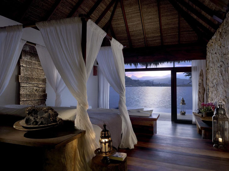 Los huéspedes de este magnífico hotel de lujo disfrutan de vistas desde su dormitorio dormitorio diseno elegancia comodidad