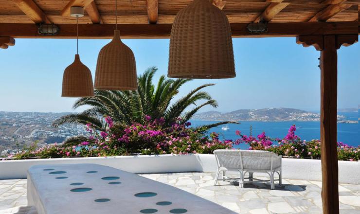 Vacaciones exóticas en la isla griega de Mykonos sol playa hotel agnandi