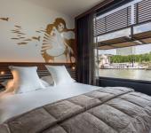 Dormitorio confortable en hotel flotante en la ciudad de luz hotel off paris seine