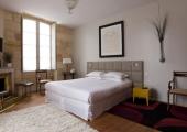 Un elegante hotel boutique con atmosfera única dormitorio espacioso con vistas