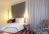 dormitorio coqueto harmoni hotel
