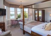 Suite diseñado de chic y lujo con vistas impresionantes suite diseno chic vistas