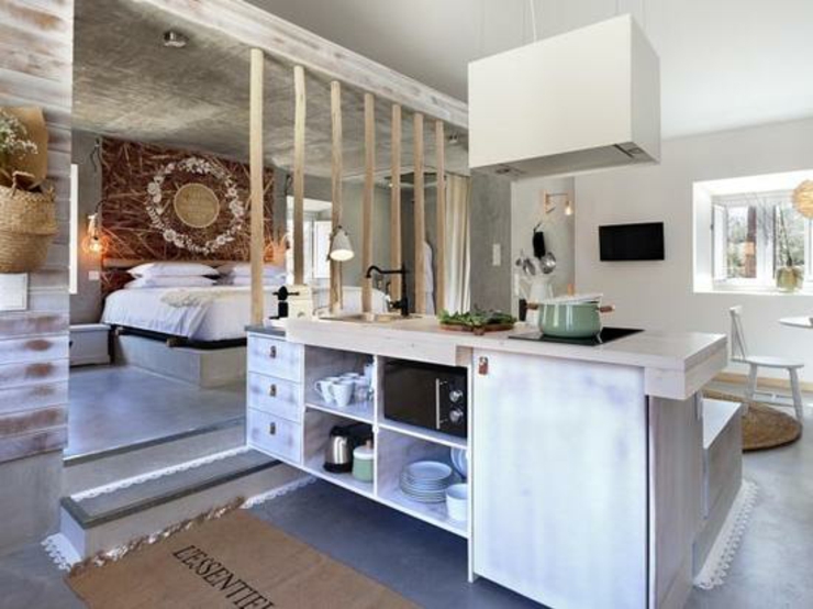 Elegante suite con sala de estar y cocina equipada comoda suite hotel boutique