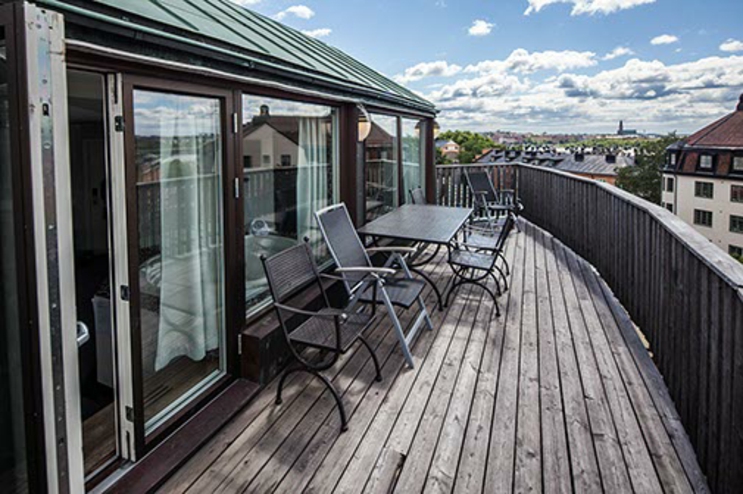 Suite lujosa con terraza ofrece alojamiento en Estocolmo parte hotel terraza suite confortable