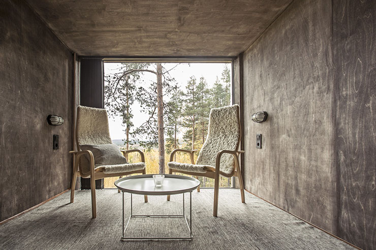 Habitación con baño en Treehotel, Suecia con vistas habitacion ubicada copas arboles